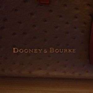 Dooney & Bourke Bags - Dooney Bourke grey ostrich bag. New condition. Dooney & Bourke Bags - Dooney Bourke grey ostrich bag. New condition.